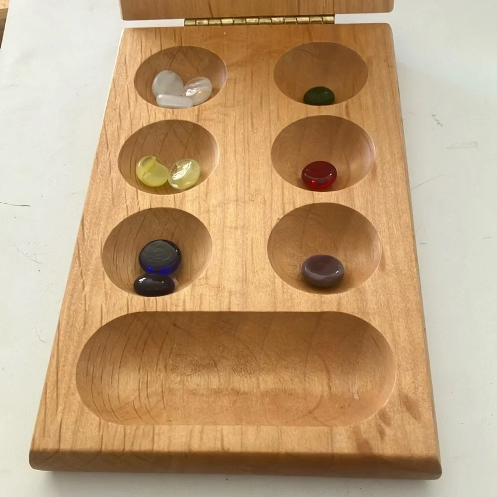 Polished stones in wooden box